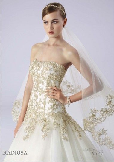 Abito da sposa bianco e oro