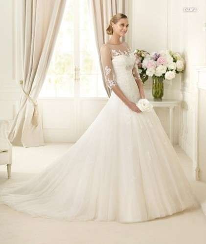 Abito da sposa maniche pizzo