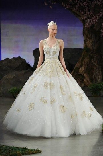 Abito da sposa bianco e oro